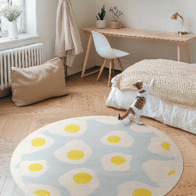 Covor rotund din vinil Ouă plantate pe un fundal albastru
