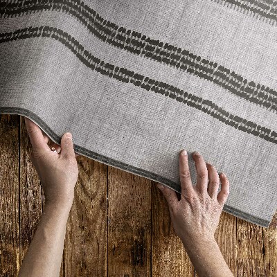 Covor de vinil Gri în liniile țesăturii de imitație boho