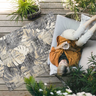 Covor de vinil Motiv cu frunze de Monstera textură uzată