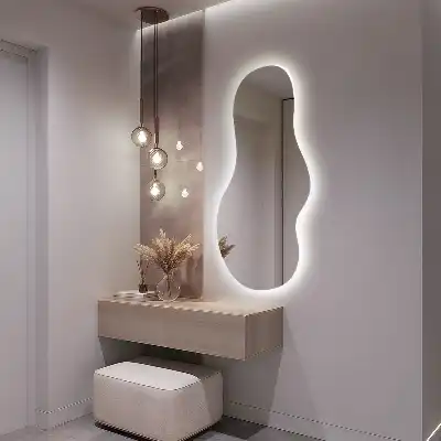 Oglindă organică suspendată cu iluminare LED și formă unică