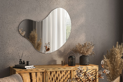 Oglindă decorativă organică fără ramă pe perete