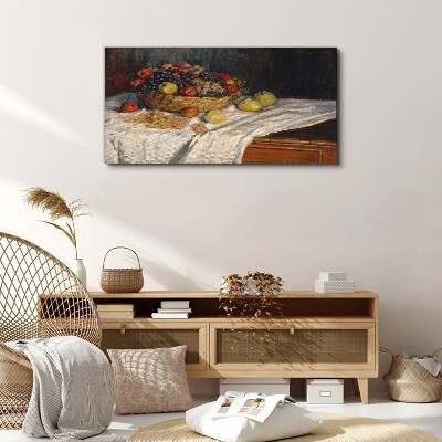 Tablou canvas Coș cu fructe pe o față de masă albă