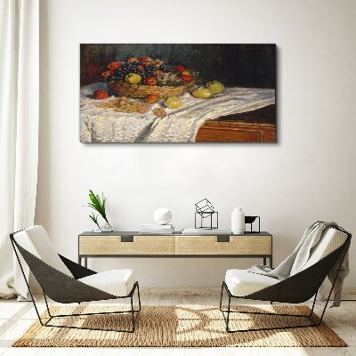 Tablou canvas Coș cu fructe pe o față de masă albă