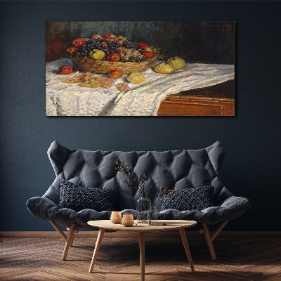 Tablou canvas Coș cu fructe pe o față de masă albă