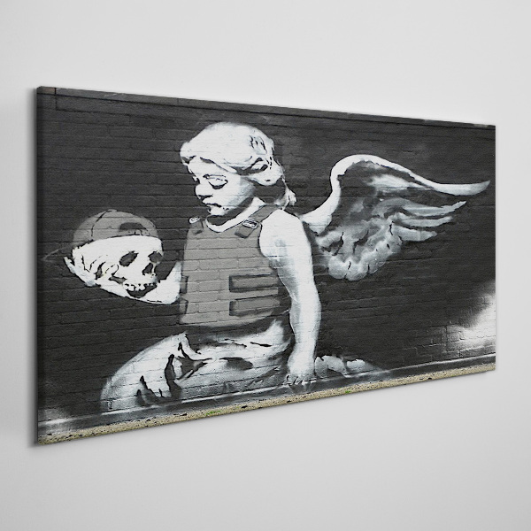 Tablou canvas Înger cu un craniu în fundal de graffiti