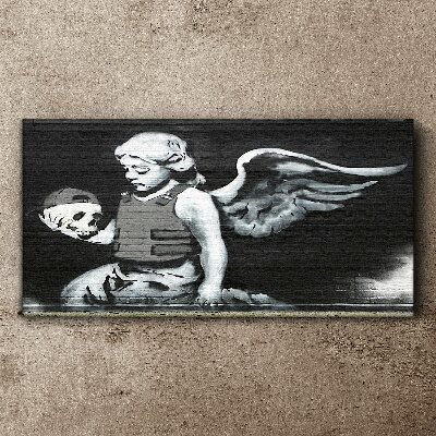 Tablou canvas Înger cu un craniu în fundal de graffiti