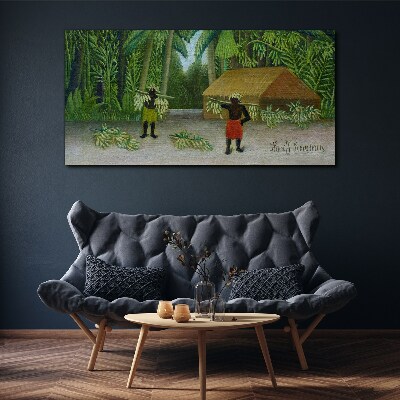 Tablou canvas Recolta de banane într-un peisaj tropical