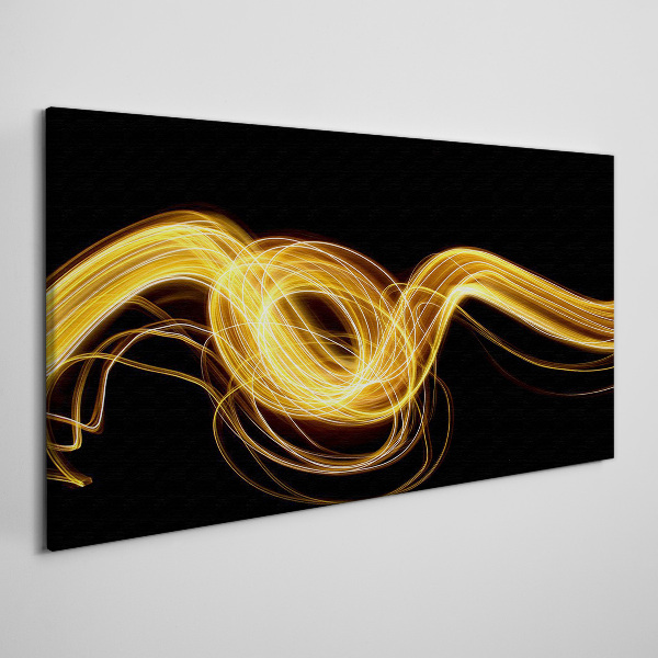 Tablou canvas Dâre aurii de lumină pe negru