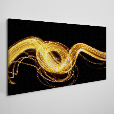 Tablou canvas Dâre aurii de lumină pe negru