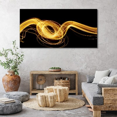 Tablou canvas Dâre aurii de lumină pe negru