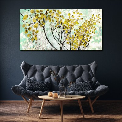 Tablou canvas Frunze de primăvară pe fundal albastru