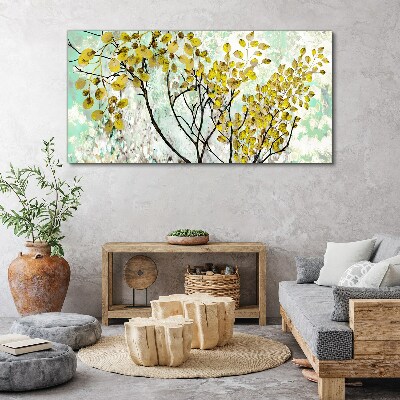 Tablou canvas Frunze de primăvară pe fundal albastru