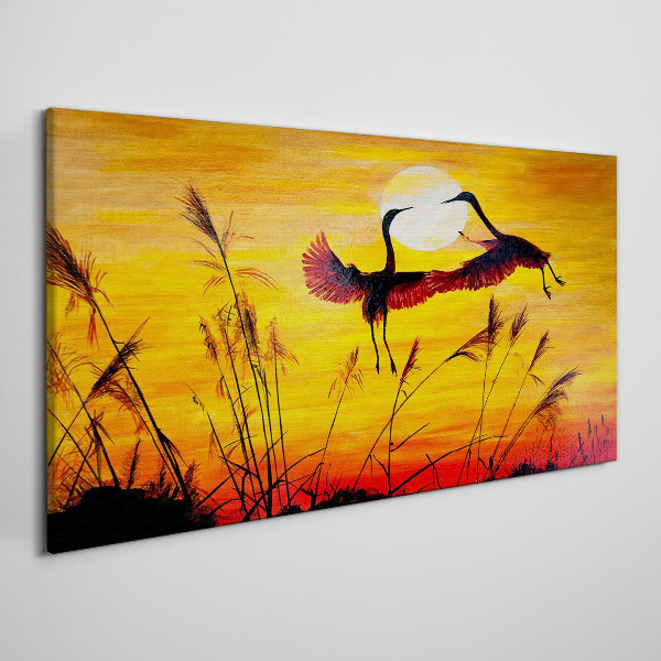 Tablou canvas Macarale dansând la apus