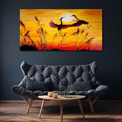 Tablou canvas Macarale dansând la apus