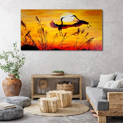 Tablou canvas Macarale dansând la apus
