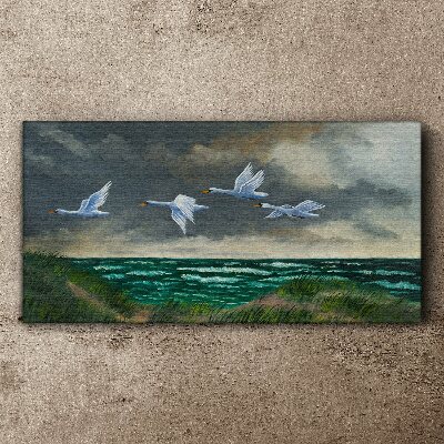 Tablou canvas Zborul lebedelor peste mare
