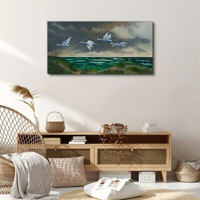 Tablou canvas Zborul lebedelor peste mare