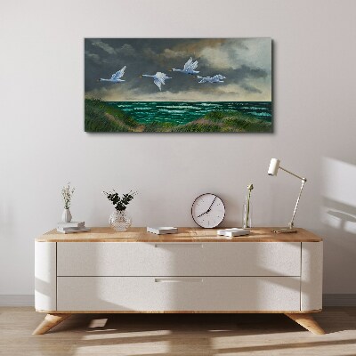 Tablou canvas Zborul lebedelor peste mare