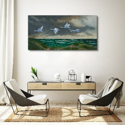Tablou canvas Zborul lebedelor peste mare