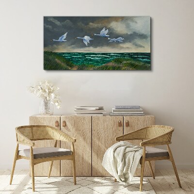 Tablou canvas Zborul lebedelor peste mare