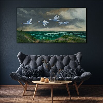 Tablou canvas Zborul lebedelor peste mare