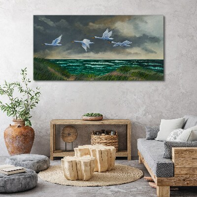 Tablou canvas Zborul lebedelor peste mare