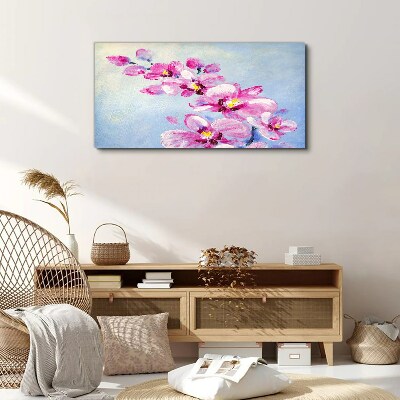 Tablou canvas Orhidee roz pe fond albastru