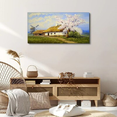 Tablou canvas Peisaj rural cu o moară de vânt și flori
