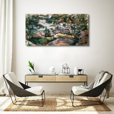 Tablou canvas Un peisaj pietros printre copaci
