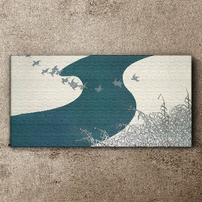 Tablou canvas Un râu calm cu păsări care zboară departe
