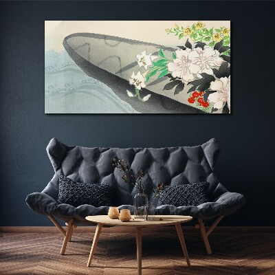Tablou canvas Barcă cu flori pe apă calmă