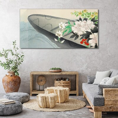 Tablou canvas Barcă cu flori pe apă calmă