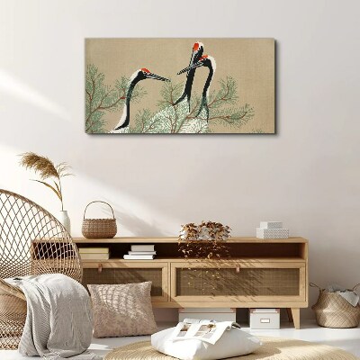 Tablou canvas Trei macarale printre crengile de pin