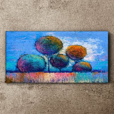 Tablou canvas Copaci colorați pe un fundal albastru