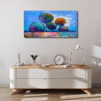 Tablou canvas Copaci colorați pe un fundal albastru