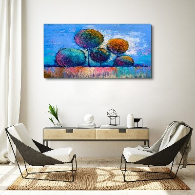 Tablou canvas Copaci colorați pe un fundal albastru