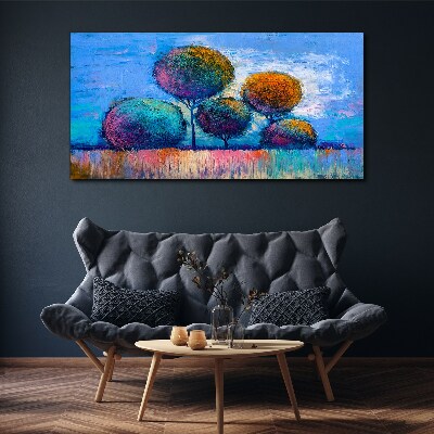Tablou canvas Copaci colorați pe un fundal albastru