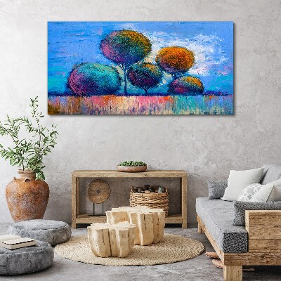 Tablou canvas Copaci colorați pe un fundal albastru