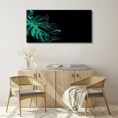 Tablou canvas Frunze verzi pe fond negru