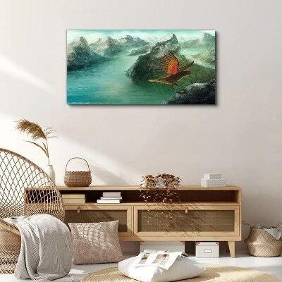 Tablou canvas Vultur peste un lac de munte