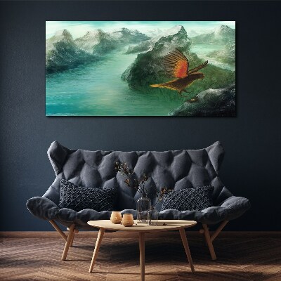 Tablou canvas Vultur peste un lac de munte