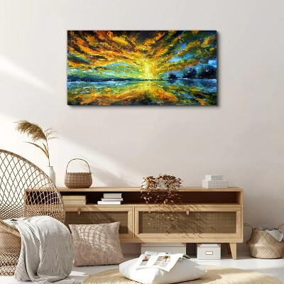 Tablou canvas Nori aurii deasupra apei calme