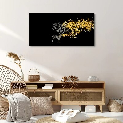 Tablou canvas Frunze aurii pe fundal negru