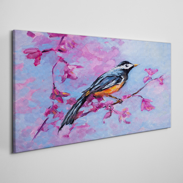 Tablou canvas Pasăre de primăvară pe ramuri roz