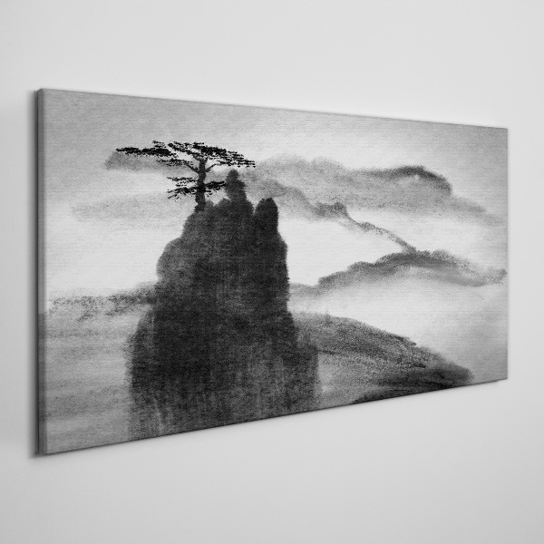 Tablou canvas Un copac singuratic pe un munte stâncos