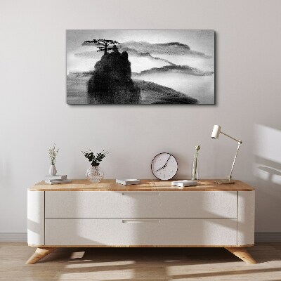 Tablou canvas Un copac singuratic pe un munte stâncos