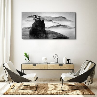 Tablou canvas Un copac singuratic pe un munte stâncos