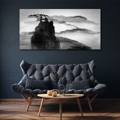 Tablou canvas Un copac singuratic pe un munte stâncos