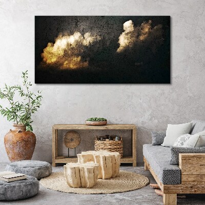 Tablou canvas Nori aurii pe un fundal întunecat