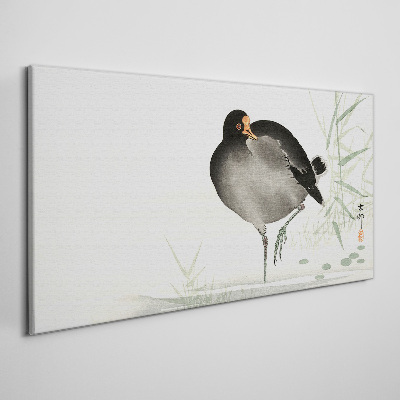 Tablou canvas Pasăre pe fundal de iarbă